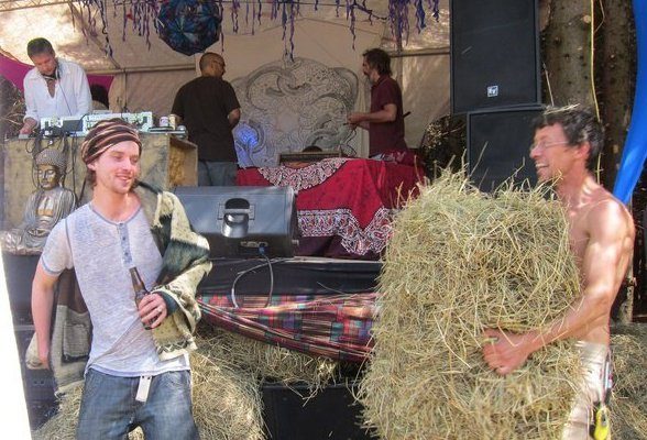 Carrying the hay for the beds, 2011.