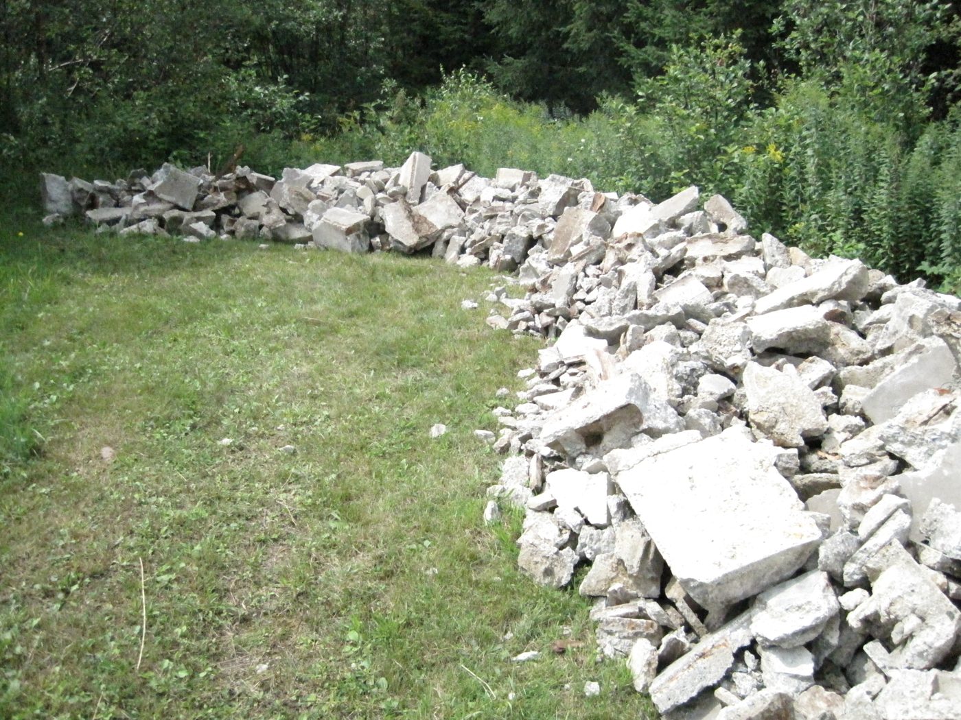The wall of broken concrete, by hand, one piece at a time.