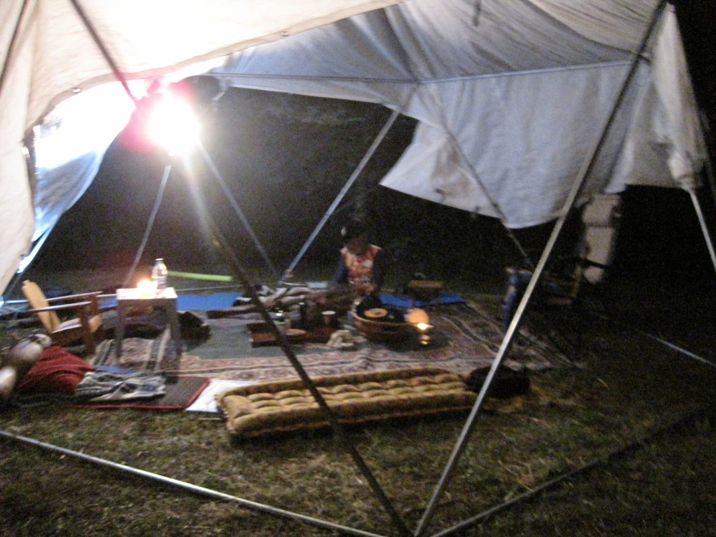 July 13, 2010: the kitchen tent, the table, the lamps.