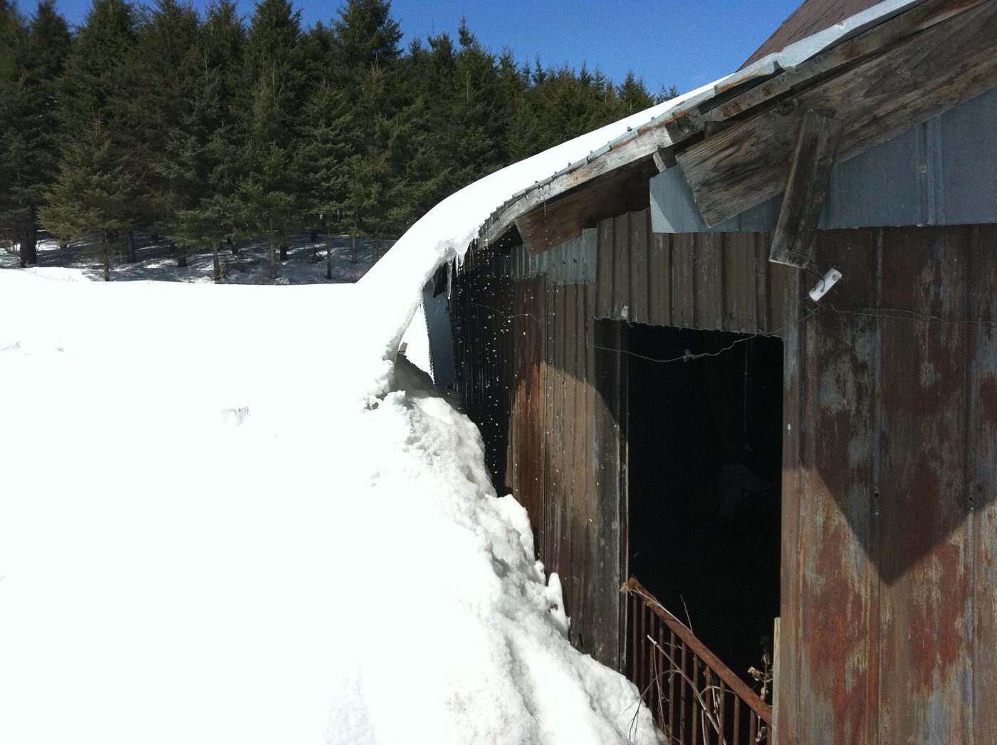 The bunker under the snow, with its garage doors, winter 2011.